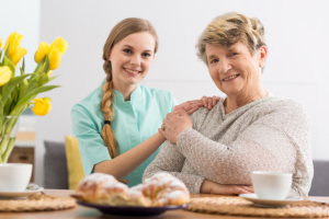 Senior about to have a meal prepared by the caregiver
